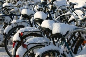 snow on the bicycles