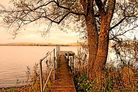 Wooden old pier on a lake