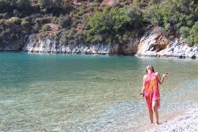 woman in Mugla Beach standing, turkey