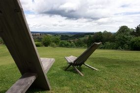 garden chair in a green meadow