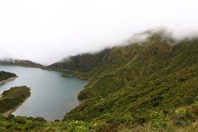 lake among green hills on the Azores