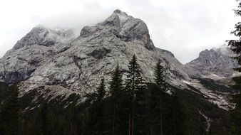 clouds at Alm Mountain summits, Alpine landscape
