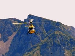 rescue helicopter in the mountains