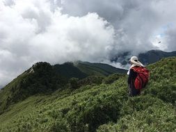 tourist among the green hills of taiwan