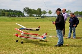 plane models on remote control in the green field