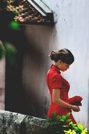 Young girl with the red dress in Vietnam