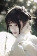 Chinese woman in traditional costume close-up