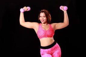 athletic girl in pink tracksuit