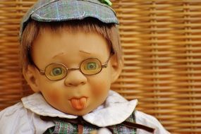 doll with glasses and with his tongue hanging out