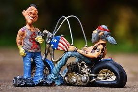 ceramic figures of two bikers