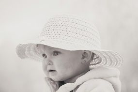 pretty caucasian Child girl in Hat, Black And White