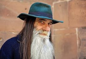 an elderly man with a long beard