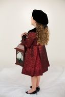 little girl in red coat