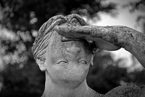 sculpture with face upside down