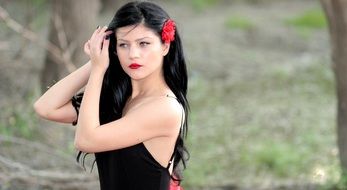 Girl Blue Eyes Brunette Red flower in hairs