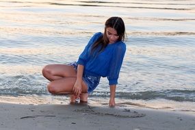 sensual girl near the surf