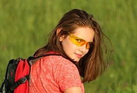 girl tourist with а backpack