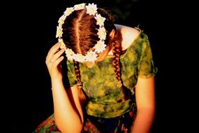 Girl with flower wreath on head