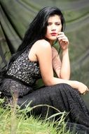 brunette model in black dress