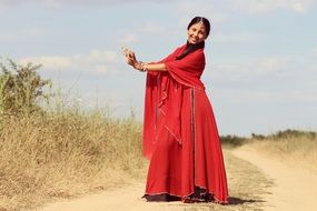 young indian woman in red sari