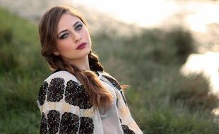 beautiful caucasian young girl posing outdoor