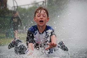 baby in deep water after rain