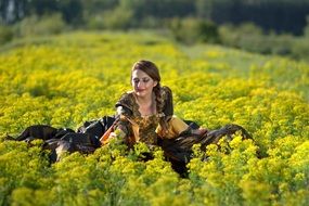 girl like a princess among a colorful field