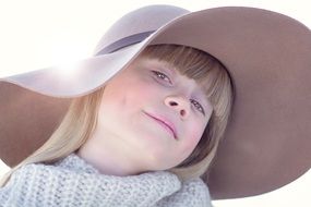 child girl in wide hat