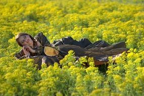 girl in a beautiful dress among the colorful field