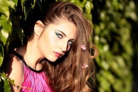 sensual model with flowers in hair