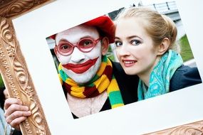 a girl and a clown portrait