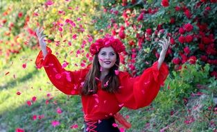 woman throwing rose petals