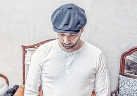 Man with the beard and flat cap