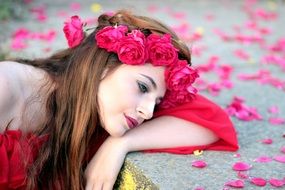 thoughtful woman with rose wreath