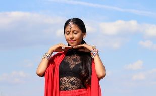 young indian lady in a dance pose