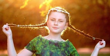 pretty child girl with pigtails