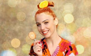 happy model with lollipop