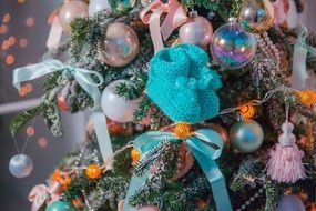 baby blue socks on a christmas tree