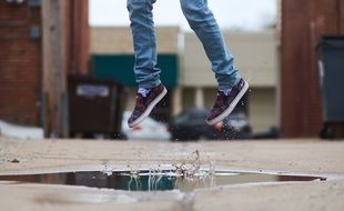 legs of a girl jumping for joy