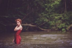 Girl in the water in summer