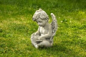 Beautiful Statue Of The Angel On The Grass