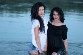 two girls in water photo