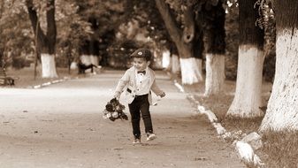 Vintage photo of the child with the bouquet