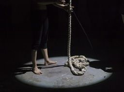 photo of magician's legs and rope