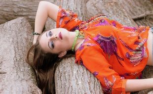 Beauty girl lying on the wood