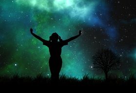 silhouette of a girl on a fantastic night sky background