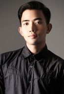 portrait of an asian guy in a black shirt