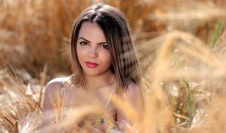 beautiful girl on the field closeup