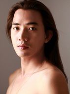 portrait of a man with long hair in Thailand