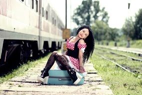 girl sitting on the platform